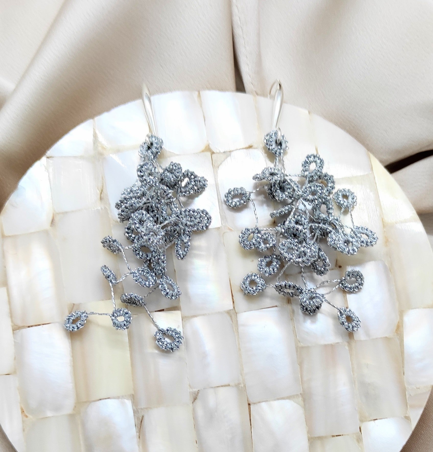 CASCADE. Haute couture earrings, made in tatting
