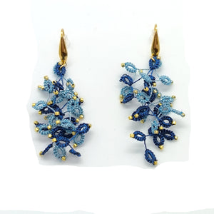 boucles d'oreilles en dentelle de frivoité et verres japonais. deux coloris. Pilar Navarro PARIS