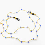 Cargar imagen en el visor de la galería, Pilar Navarro PARIS | Chaîne a lunettes faite à la main en fil et verres facettés bleus 
