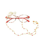 Cargar imagen en el visor de la galería, Pilar Navarro PARIS | Chaîne a lunettes faite à la main en fil et verres facettés rouges 
