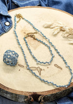 Load image into Gallery viewer,  PARURE en dentelle bleue en aqua-marines naturelles avec chaîne ajustable Pilar Navarro PARIS
