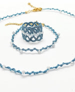 Cargar imagen en el visor de la galería, Bracelet en dentelle bleue en aqua-marines naturelles avec chaîne ajustable Pilar Navarro PARIS
